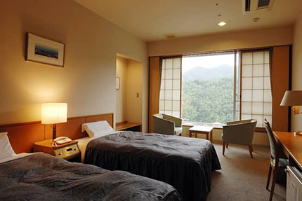 机椅子のある客室例